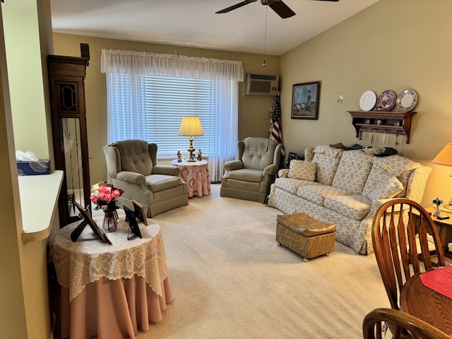 living room featuring carpet flooring, a wall mounted air conditioner, a ceiling fan, and vaulted ceiling