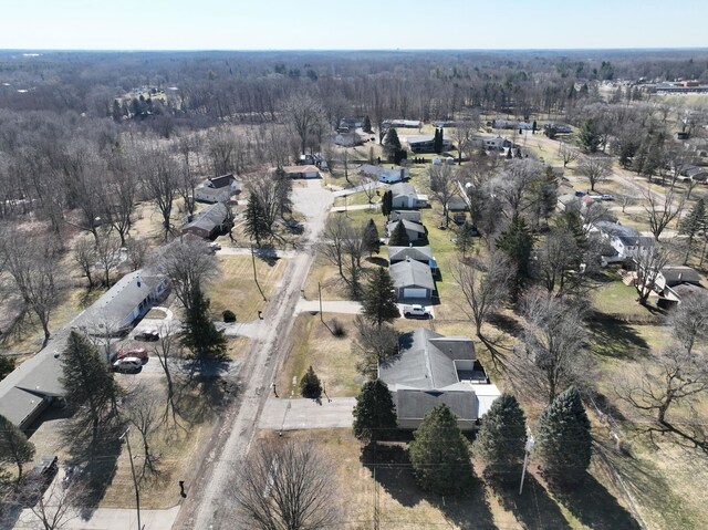 aerial view featuring a view of trees