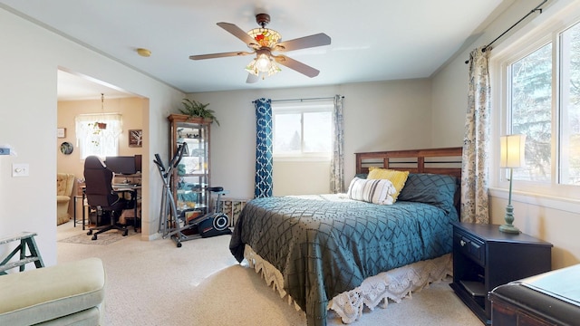 bedroom featuring ceiling fan and carpet floors