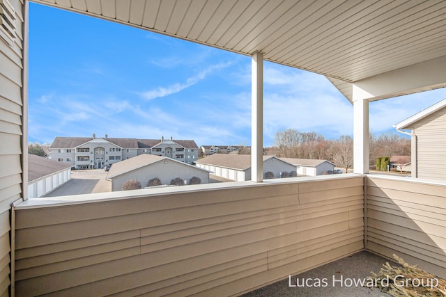 balcony featuring a residential view