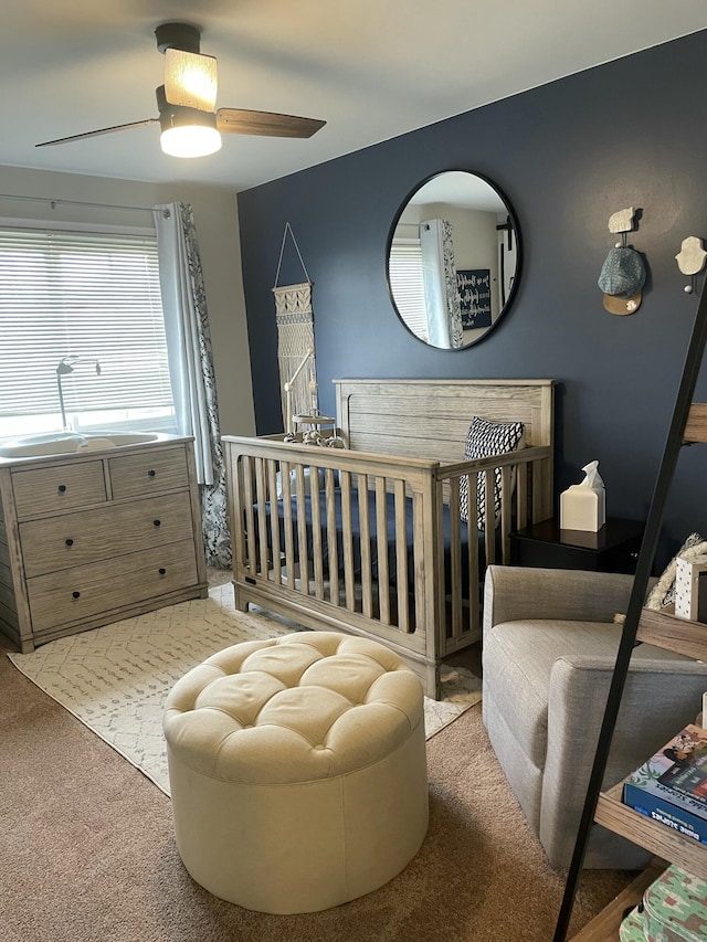 bedroom featuring a ceiling fan and carpet flooring