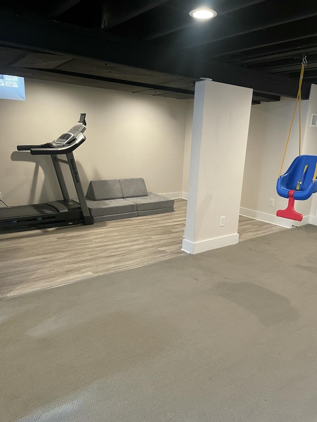 workout room with recessed lighting, baseboards, and carpet