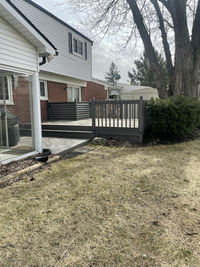 view of yard with a wooden deck