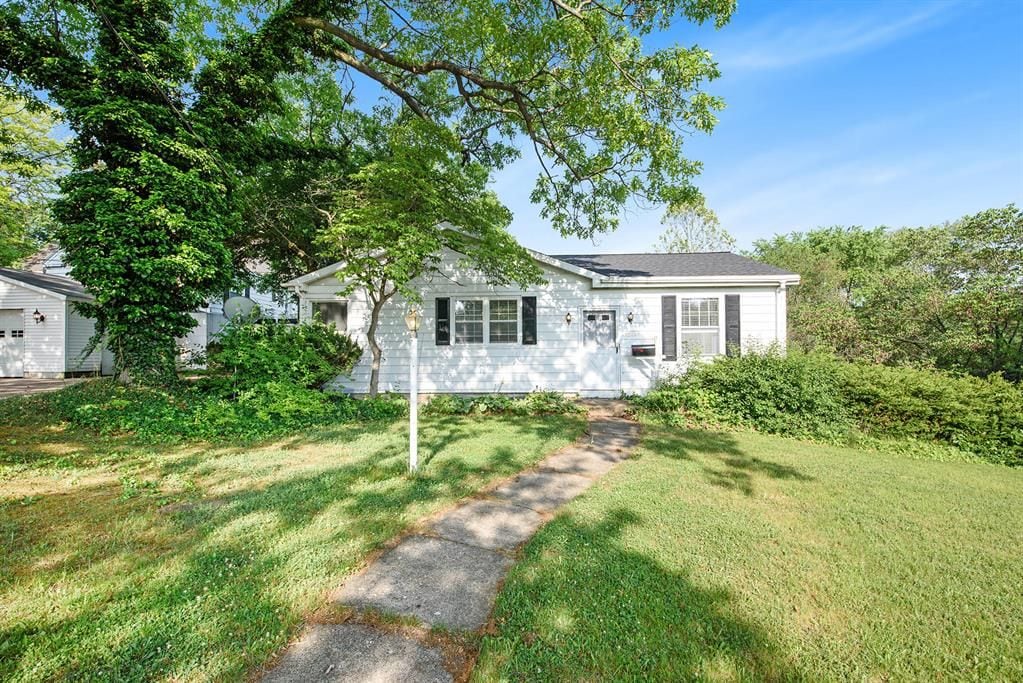 view of front of home with a front yard
