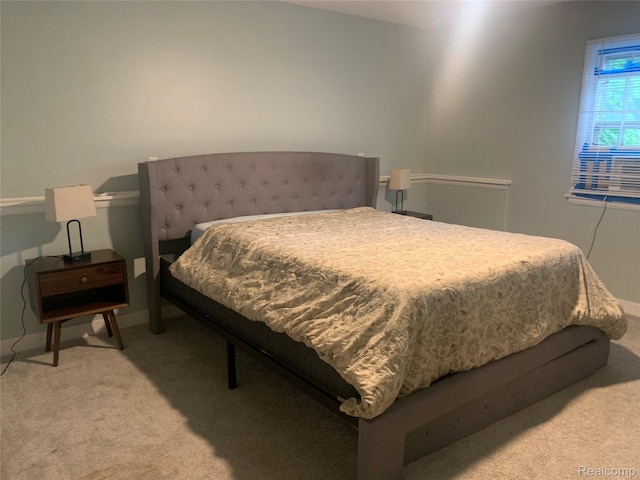 1211 Plymouth Ave SE, Grand Rapids, MI 49506 - bedroom with light carpet and baseboards