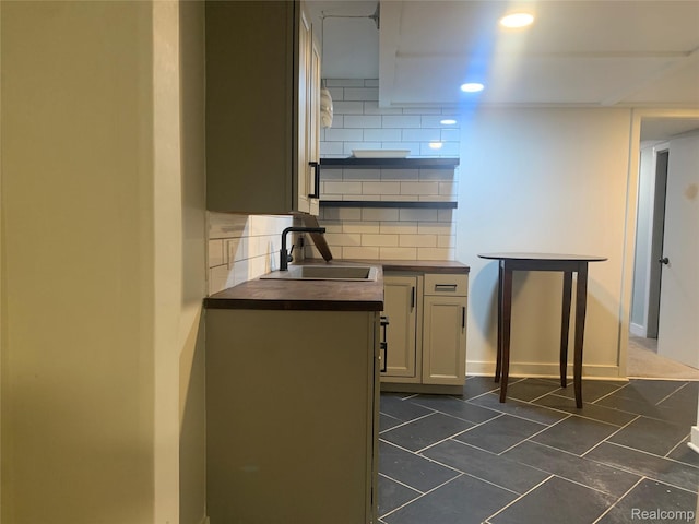 1211 Plymouth Ave SE, Grand Rapids, MI 49506 - kitchen featuring tasteful backsplash, recessed lighting, open shelves, and dark tile patterned flooring