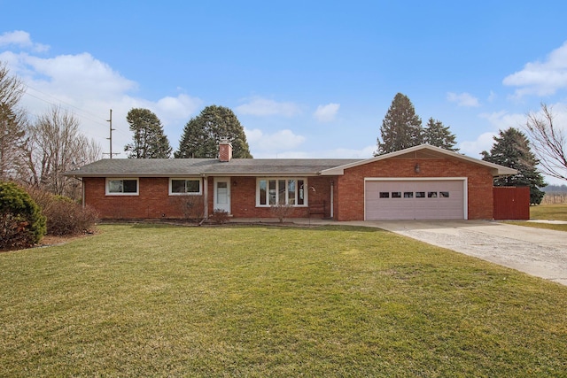 ranch-style home with brick siding, an attached garage, driveway, and a front yard