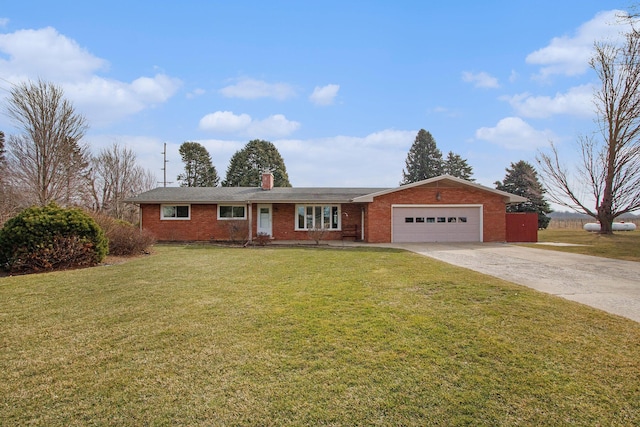 single story home with an attached garage, a chimney, concrete driveway, a front lawn, and brick siding