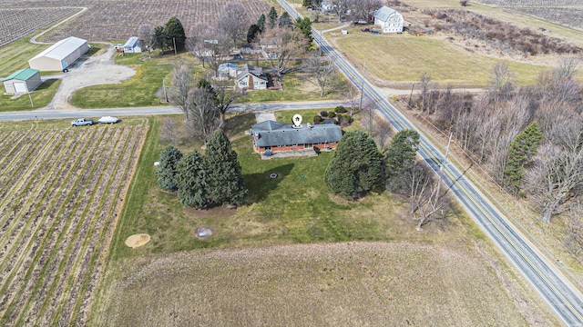 birds eye view of property featuring a rural view