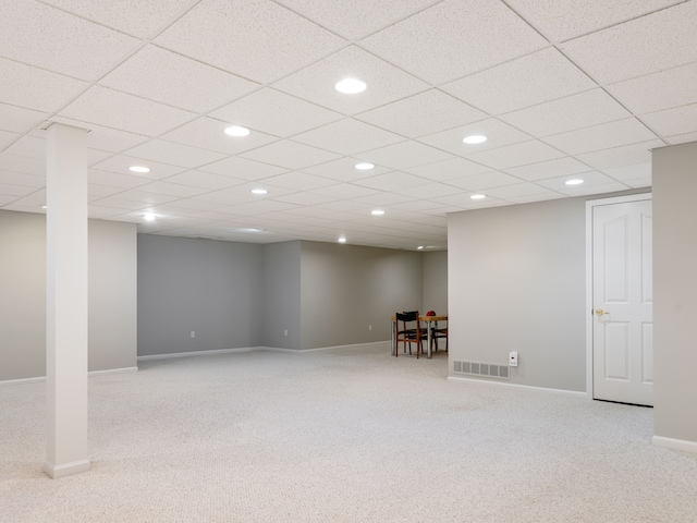 finished basement featuring recessed lighting, visible vents, carpet flooring, and baseboards