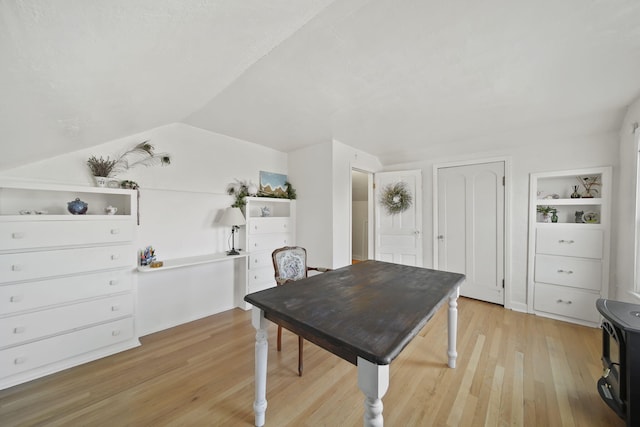 dining space with light wood-style flooring