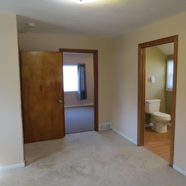 interior space featuring visible vents and baseboards