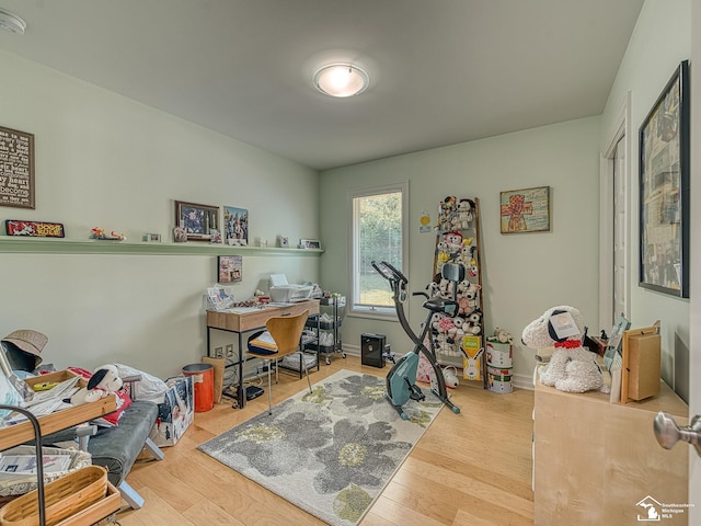 office space featuring wood finished floors and baseboards