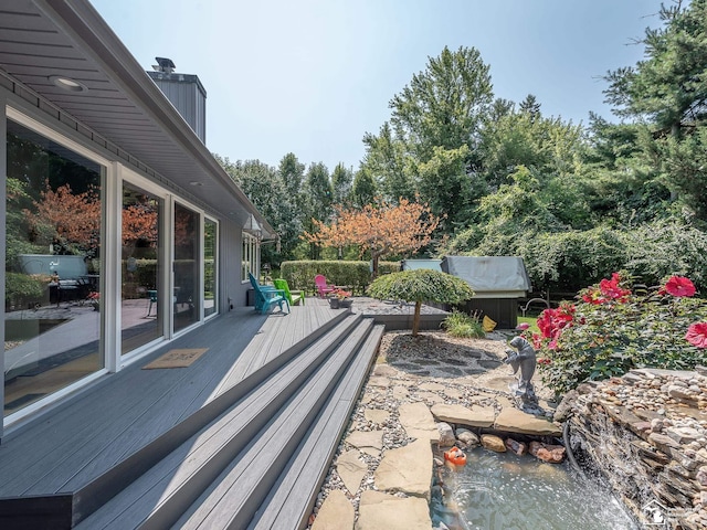 view of patio / terrace featuring a wooden deck