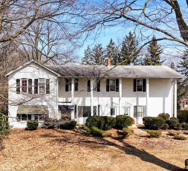 split foyer home with a chimney