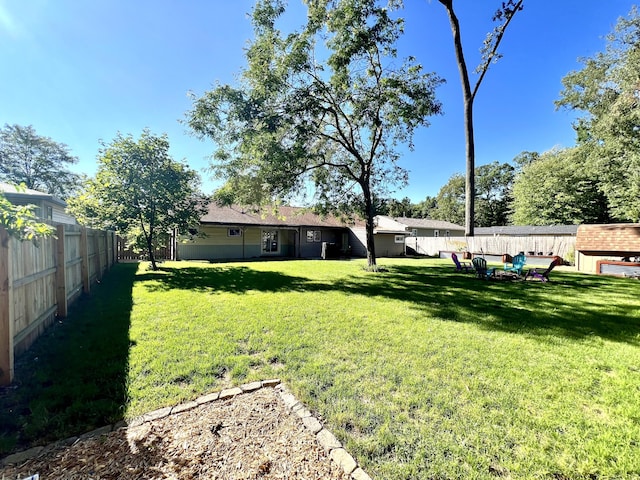 view of yard featuring a fenced backyard