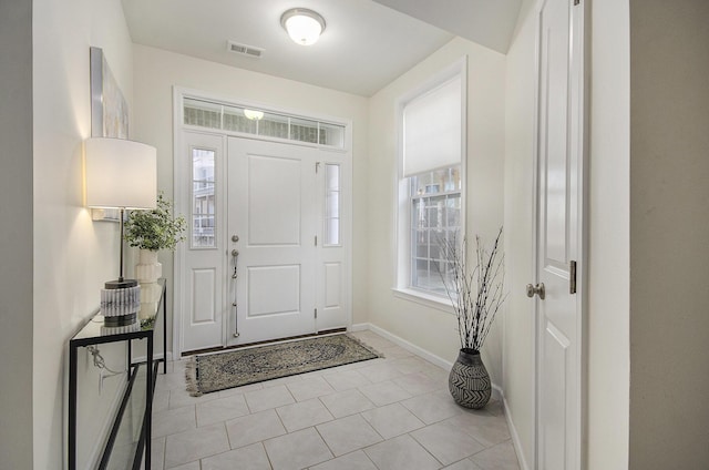 2822 Purley Ave, Ann Arbor, MI 48105 - foyer entrance featuring visible vents, baseboards, and light tile patterned flooring