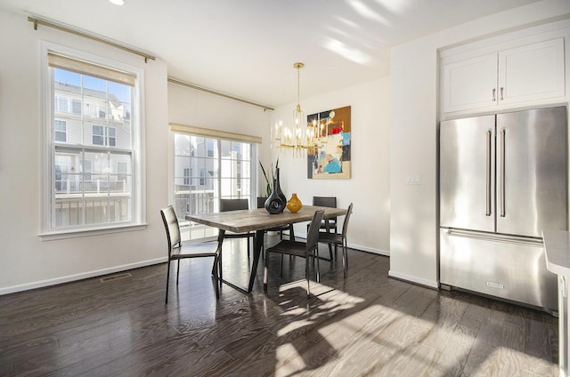 2822 Purley Ave, Ann Arbor, MI 48105 - dining space with an inviting chandelier, baseboards, dark wood finished floors, and visible vents