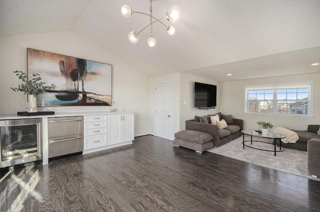 2822 Purley Ave, Ann Arbor, MI 48105 - living room with a notable chandelier, beverage cooler, vaulted ceiling, and dark wood-style floors