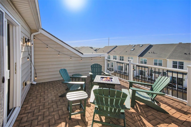 2822 Purley Ave, Ann Arbor, MI 48105 - view of patio with a fire pit and a residential view