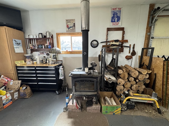 miscellaneous room with a wood stove