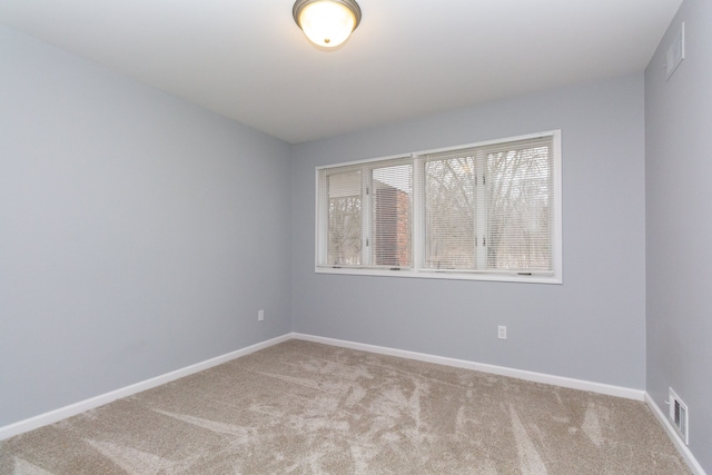 4355 S Lapeer Rd, Metamora, MI 48455 - carpeted empty room featuring visible vents and baseboards