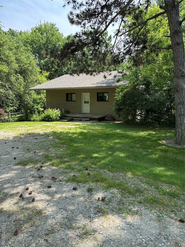 4355 S Lapeer Rd, Metamora, MI 48455 - rear view of property with a lawn and roof with shingles