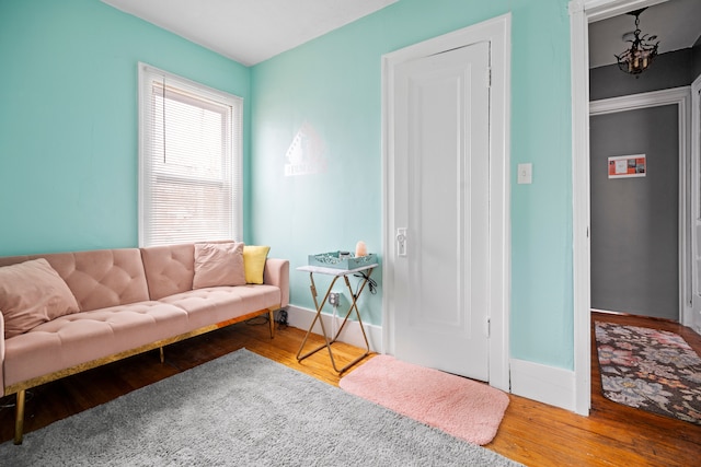 living room with wood finished floors and baseboards