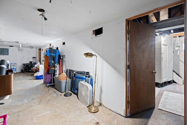 basement featuring electric panel