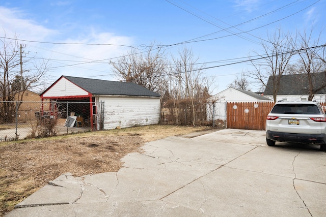 garage with fence