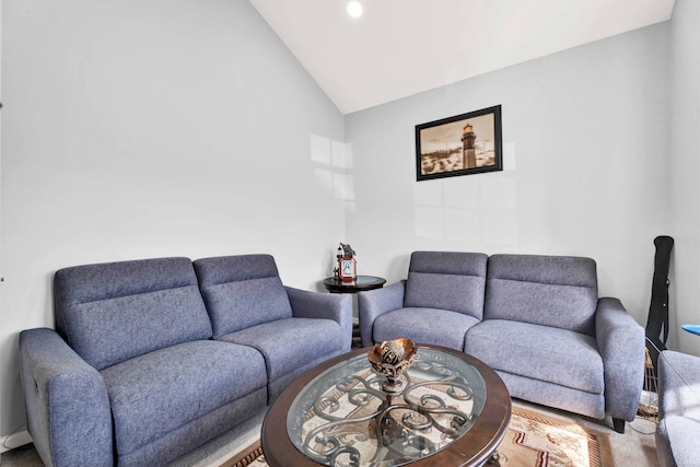 living room featuring recessed lighting and vaulted ceiling