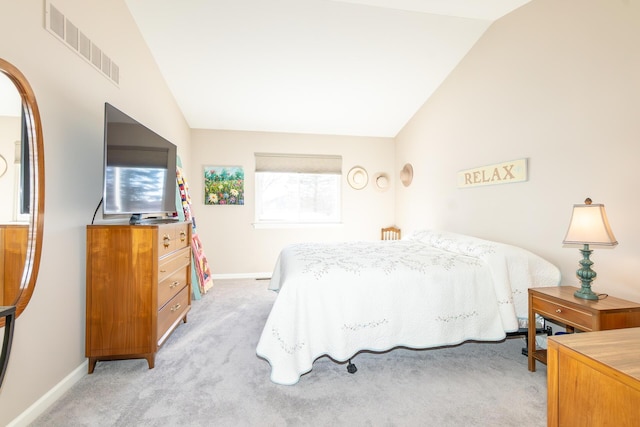 bedroom with visible vents, lofted ceiling, light colored carpet, and baseboards