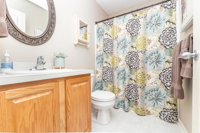 bathroom with vanity, toilet, and a shower with curtain