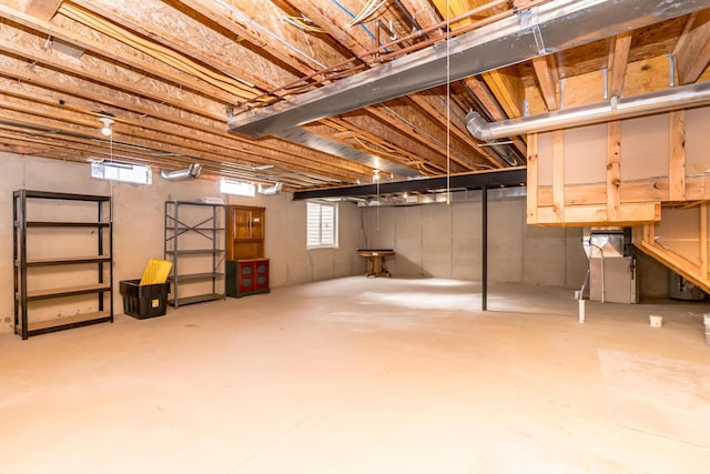 basement featuring plenty of natural light