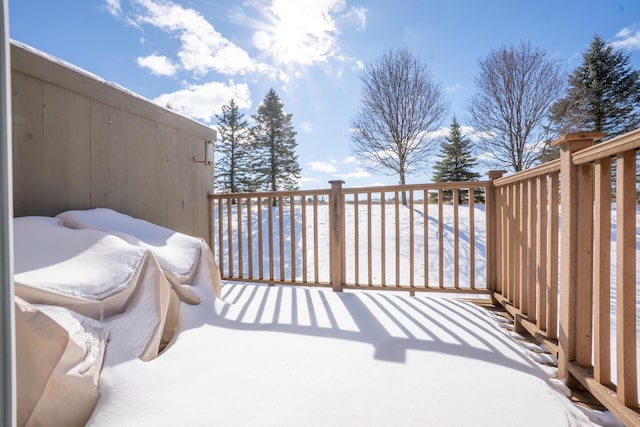 view of snow covered deck