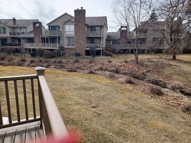 view of yard with cooling unit and a residential view