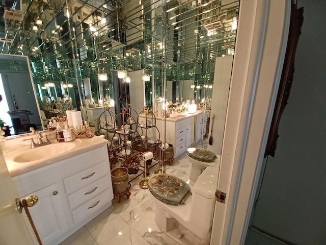 bathroom featuring vanity and marble finish floor