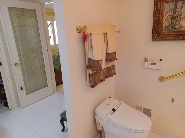 full bathroom with toilet, visible vents, and walk in shower