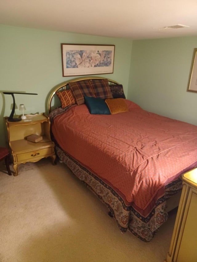 bedroom featuring carpet