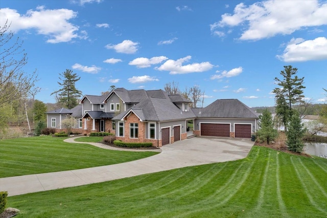 craftsman inspired home featuring brick siding, a garage, a front yard, and concrete driveway