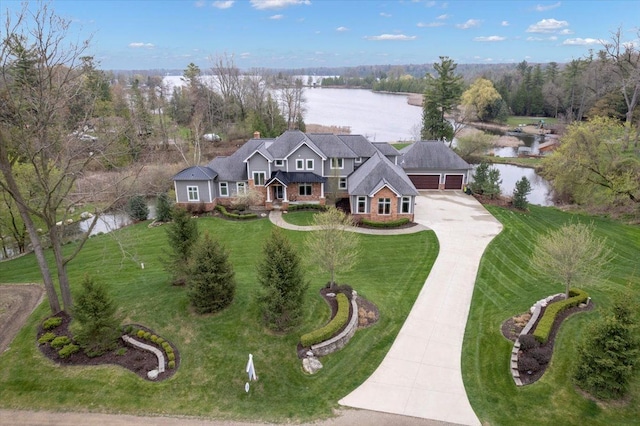 bird's eye view with a water view