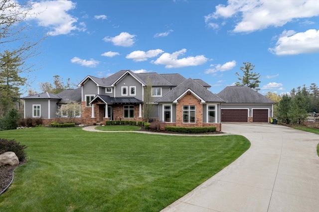 craftsman inspired home with concrete driveway, brick siding, a front yard, and a garage