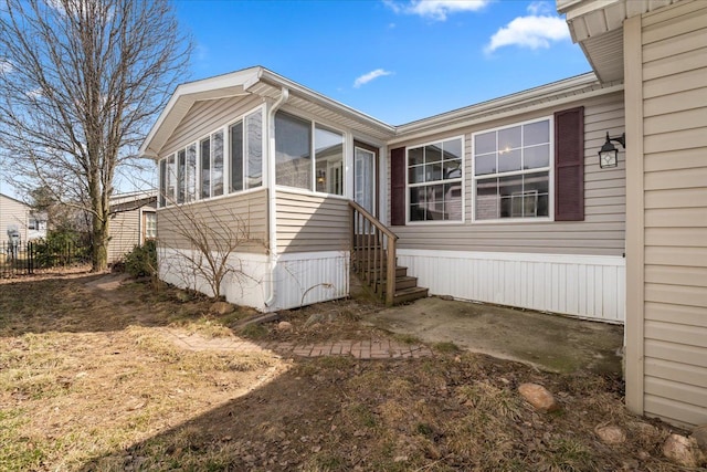 exterior space with a sunroom