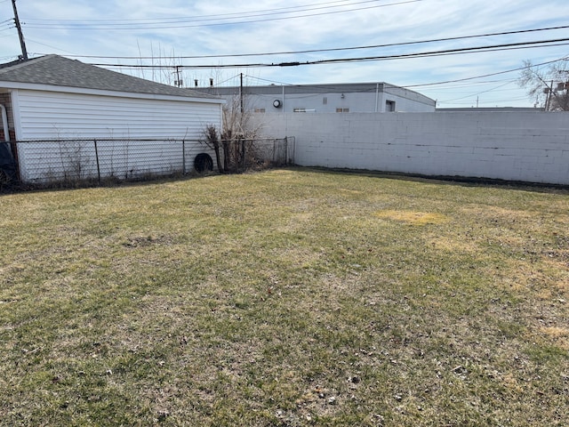 view of yard with a fenced backyard