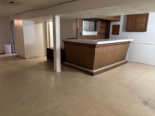 bar with tile patterned floors and indoor bar