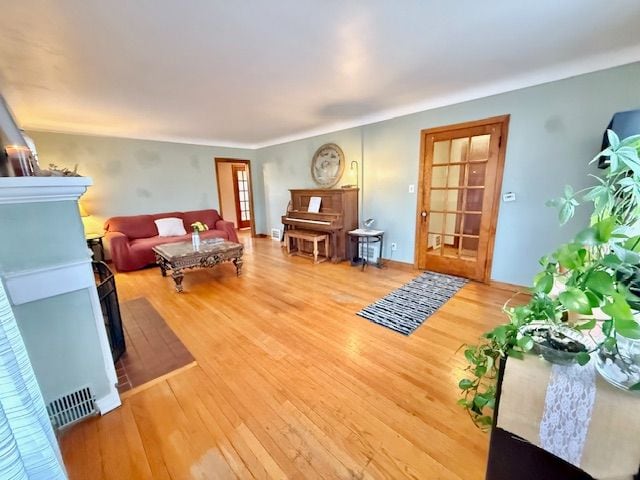 2126 Pierce St, Flint, MI 48503 - living area with wood finished floors