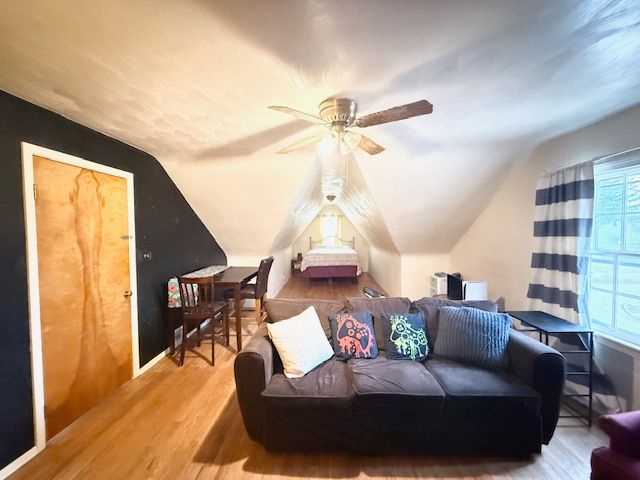 2126 Pierce St, Flint, MI 48503 - interior space with ceiling fan, vaulted ceiling, and wood finished floors