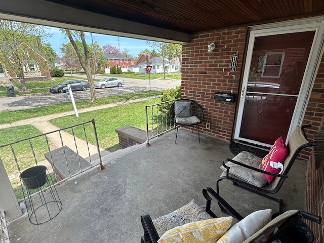 2126 Pierce St, Flint, MI 48503 - view of patio with a residential view