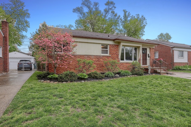 ranch-style home with brick siding, an outbuilding, a front lawn, and a garage