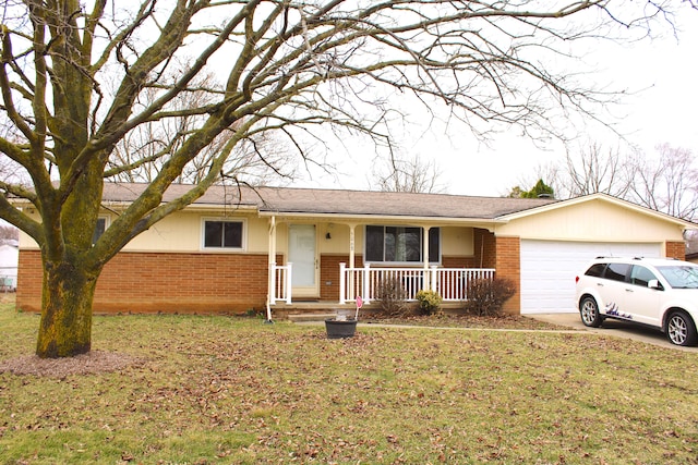 single story home featuring a front lawn, an attached garage, covered porch, and brick siding